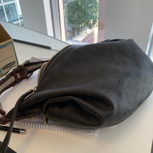 Cristina added a photo of their purchase