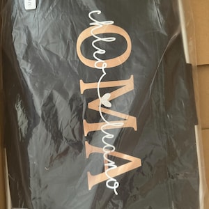 Denise added a photo of their purchase