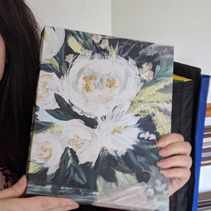 Kitty added a photo of their purchase