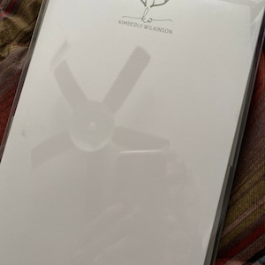 Kimberly added a photo of their purchase