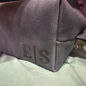 Angela added a photo of their purchase