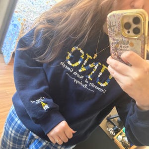 Katherine added a photo of their purchase