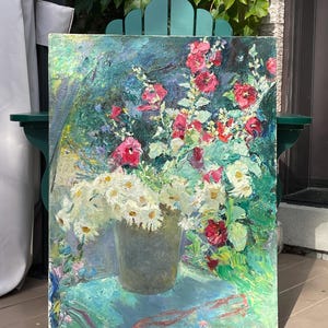 Nelya added a photo of their purchase