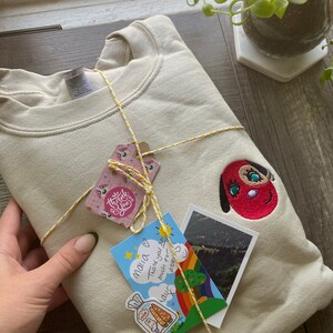 blathers animal crossing shirt