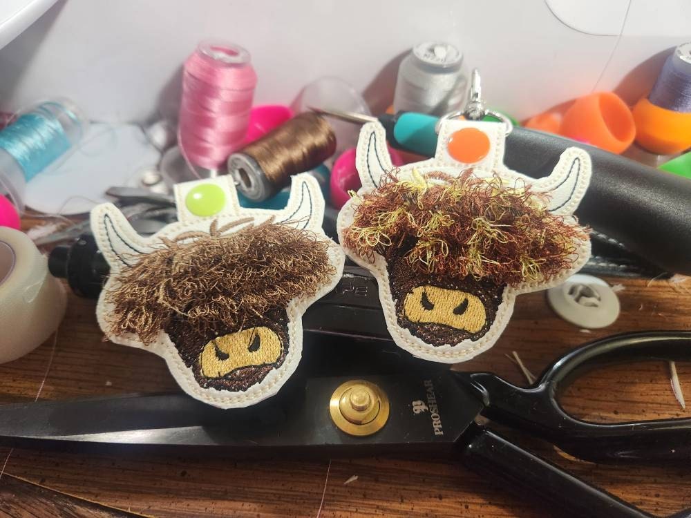 Fringed Highland cow keychain key fob snap tab in the hoop machine embroidery designs ITH project Awesome fluffy fur cow kids backpack tag