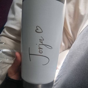 Caitlin added a photo of their purchase