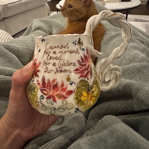Madina added a photo of their purchase