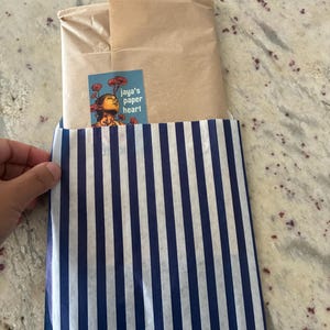Sabina added a photo of their purchase