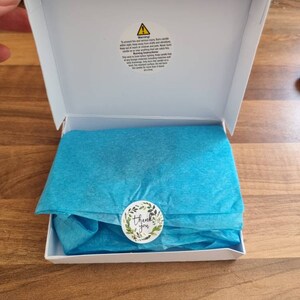 Sarah added a photo of their purchase