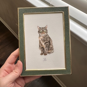 Katya added a photo of their purchase
