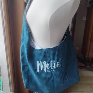 Alexandra added a photo of their purchase