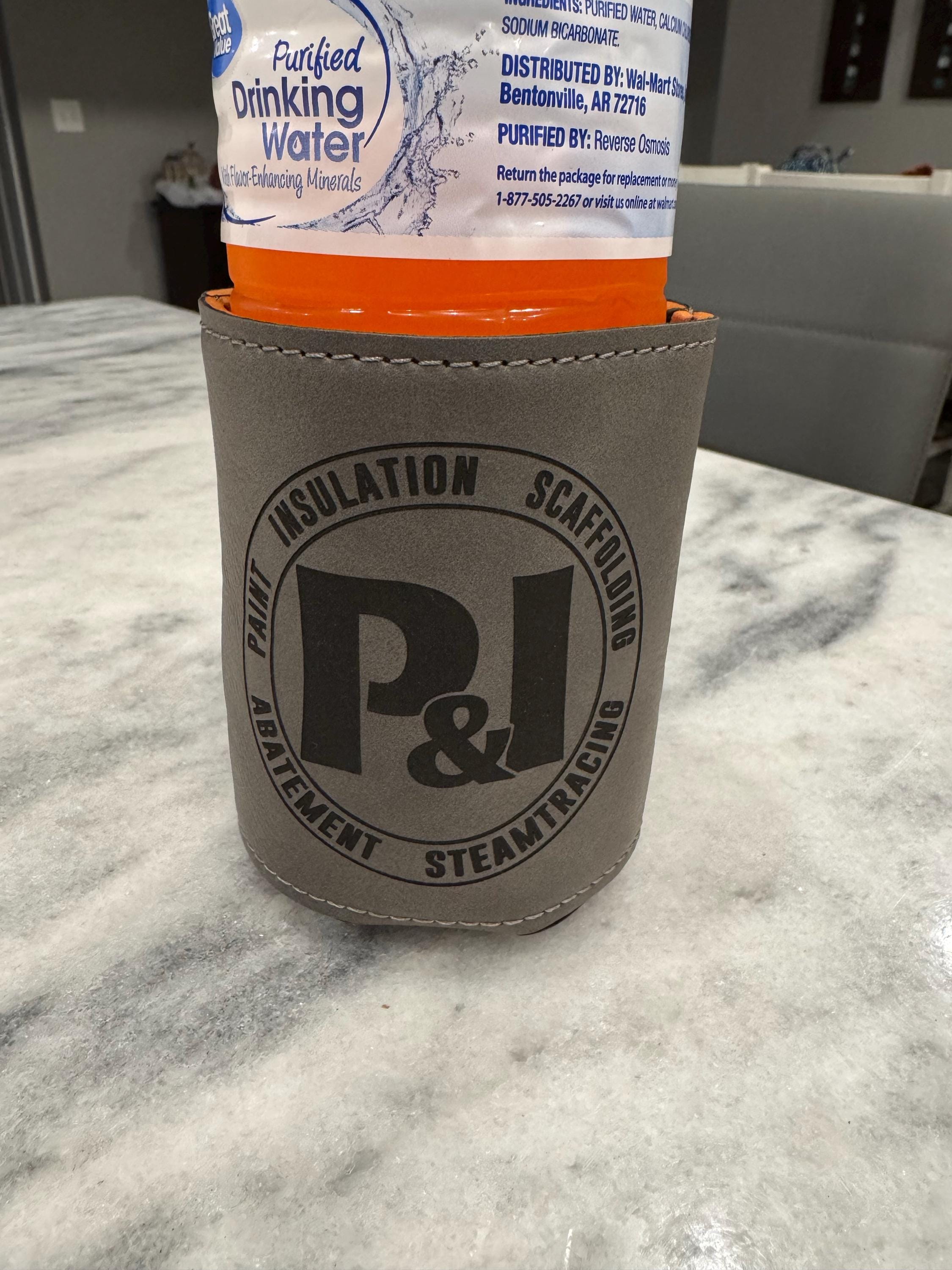 Customer photo of Custom Logo Engraved Leatherette Beverage Holder from Chelsea