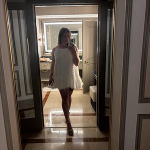 Courtney added a photo of their purchase