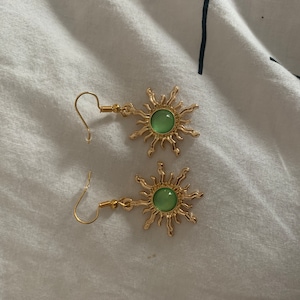 Glittery brown sun earrings main image 1