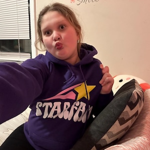 Taylor added a photo of their purchase