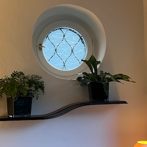 Alexandra added a photo of their purchase