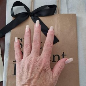 Helen added a photo of their purchase