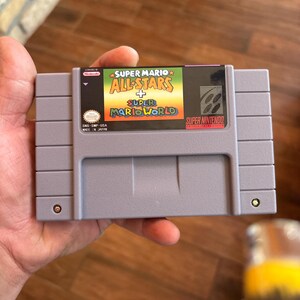 Super Mario All-Stars Super Mario World 1994 game for SNES consoles  working cartridge NTSC or PAL region Fantastic Condition