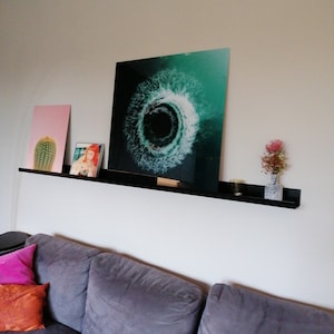 Claudia added a photo of their purchase