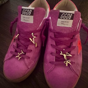 Marjorie added a photo of their purchase