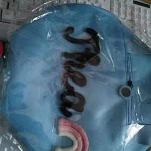 Nina added a photo of their purchase