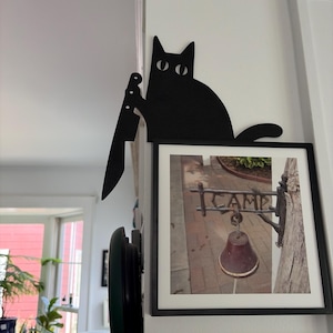 Laura added a photo of their purchase