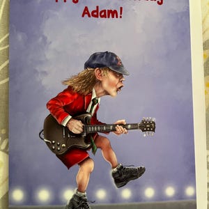 アンガス・ヤングがギターを弾きまくる - AC/DC ヘビーロック