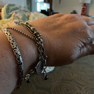 Joan added a photo of their purchase