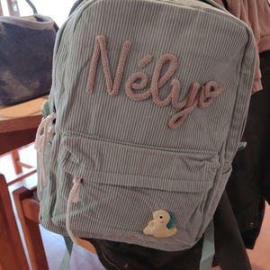 Laura added a photo of their purchase