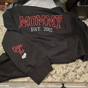 Della added a photo of their purchase