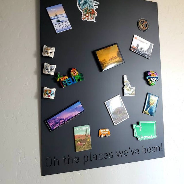 Our travel magnet board is up and it's full! Bought Sheet metal