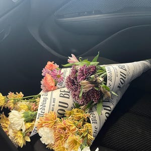 Emma added a photo of their purchase