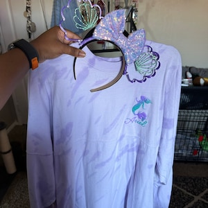 Ashley added a photo of their purchase