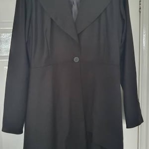 CAROLINE added a photo of their purchase