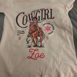 Laura added a photo of their purchase