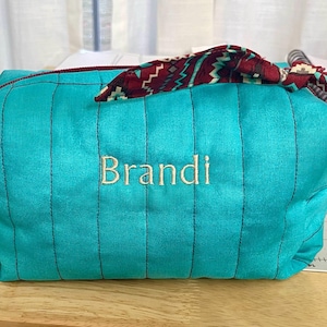 Kim added a photo of their purchase
