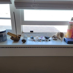 Natalie added a photo of their purchase