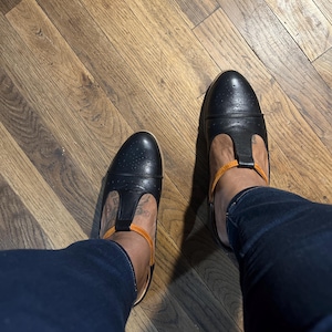 Tina added a photo of their purchase