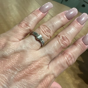 Nora added a photo of their purchase
