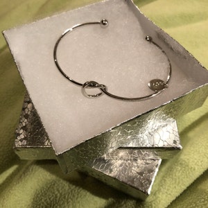 Michaela added a photo of their purchase