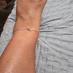 Angela added a photo of their purchase