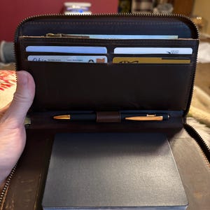CINDY added a photo of their purchase