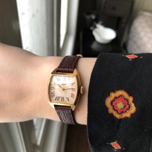 Orologio Antico Con I Numeri Romani Fotografia Stock - Immagine di