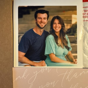 Sarah added a photo of their purchase