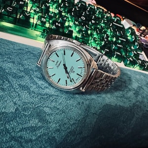 Hasan added a photo of their purchase