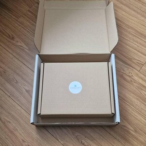 Emma added a photo of their purchase