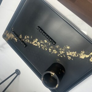 Elyse adicionaram uma foto da sua compra