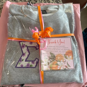 Kathryn added a photo of their purchase