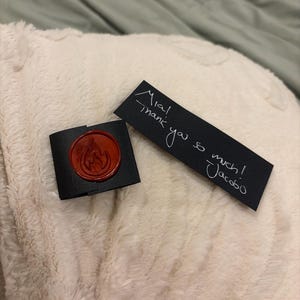 Mia added a photo of their purchase
