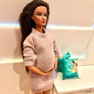 Barbie with pregnant belly